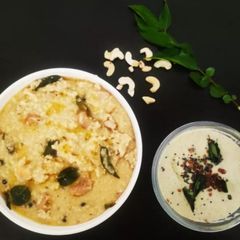 A picture of Foxtail millet ven pongal with coconut chutney.