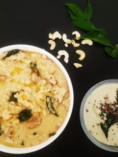 A picture of Foxtail millet ven pongal with coconut chutney.