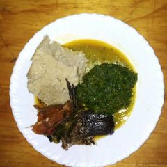 A picture of Muroo served with ugali and fish.