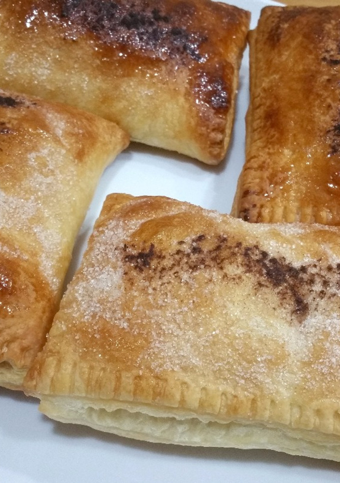 Una foto de Napolitanas de chocolate y fresa
