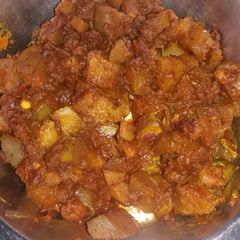 A picture of Potatoes pointed gourd prawn stir fry.