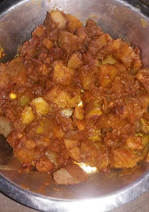 A picture of Potatoes pointed gourd prawn stir fry.
