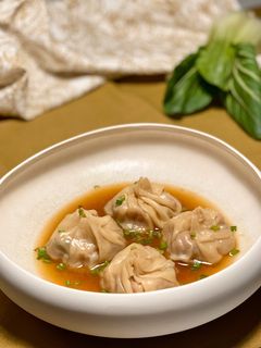 Una foto de Dumplings chinos