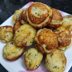A picture of Vegetable ponganalu with left over idli/dosa batter.