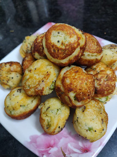 A picture of Vegetable ponganalu with left over idli/dosa batter.