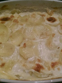 Una foto de Patatas francesas con nata y ajo