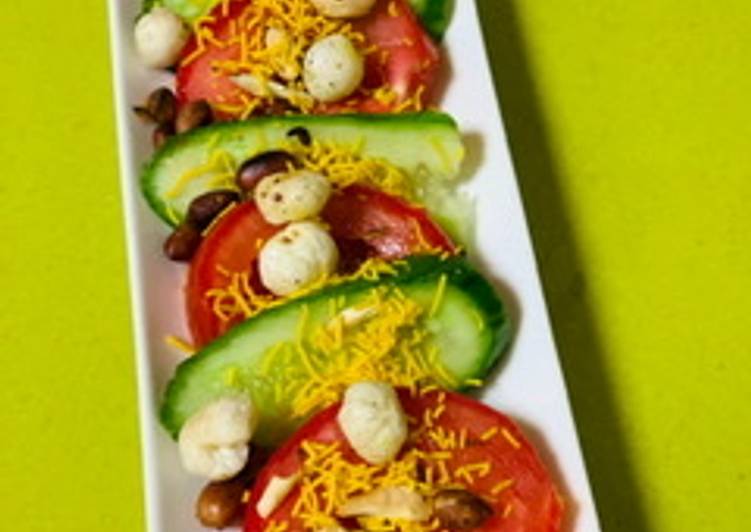 Tomato Cucumber and nuts salad
