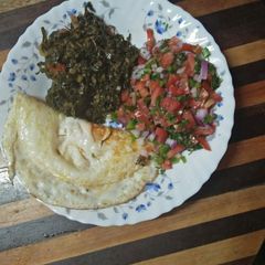 Ugali and mboga A picture of Ugali and mboga.