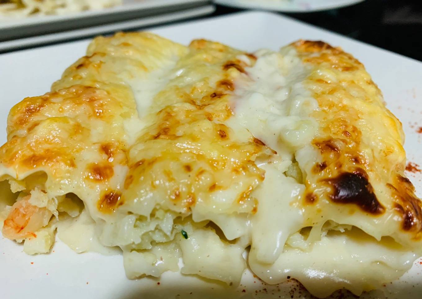 Canelones de merluza y gambas