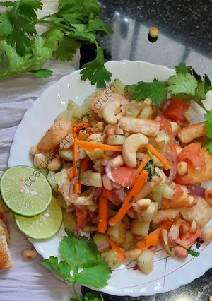 A picture of Kachumbar nuts salad with croutons.