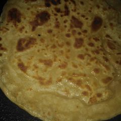 A picture of Crispy pizza paratha. 🍕.