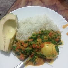 Rice Egg Curry And Avacado A picture of Rice Egg Curry And Avacado.