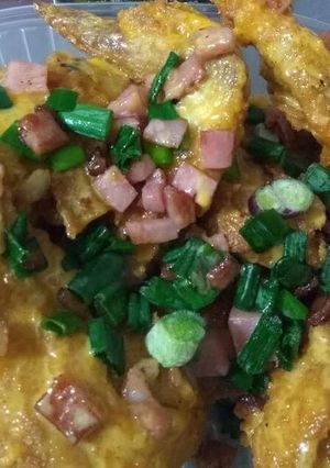 Una foto de Alitas de pollo al verdeo con cheddar y panceta😍😋