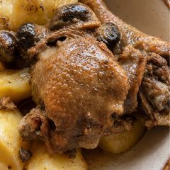 A picture of Slow-cooked Local Malawian Chicken (Nkhuku ya Lokolo).