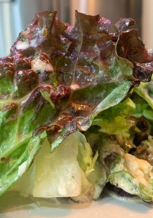 A picture of Caesar salad dressing.