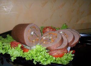 Una foto de Rollo relleno de pollo