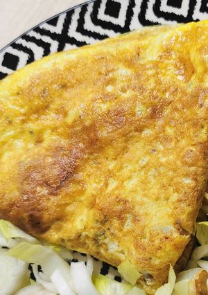 Une photo de Omelette lardons, oignons, emmental tournée