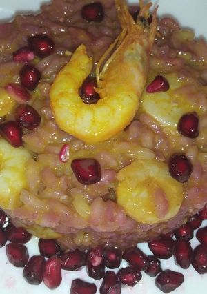 Foto di Risotto con gamberetti e succo di melograno