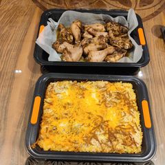 A picture of Jerk Chicken + Mac & Cheese.