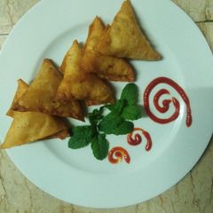 Aalu chicken samosa A picture of Aalu chicken samosa.