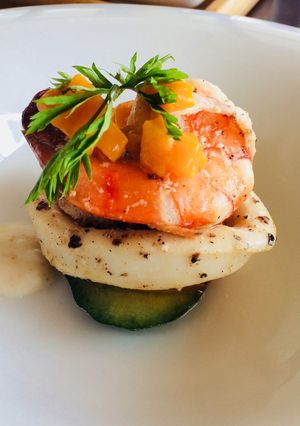 A picture of Cuttle fish salad with lemon vinaigrette.