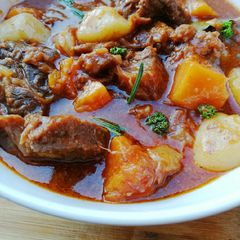 A picture of Butternut and potato beef stew.