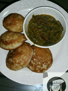 A picture of Cocount masa with groundnut soup.