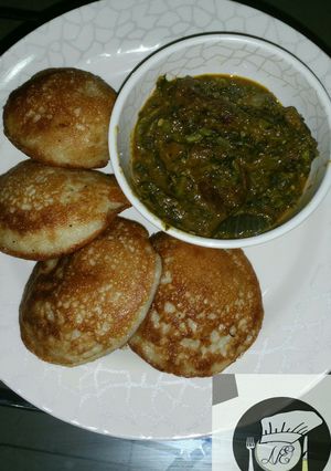 A picture of Cocount masa with groundnut soup.