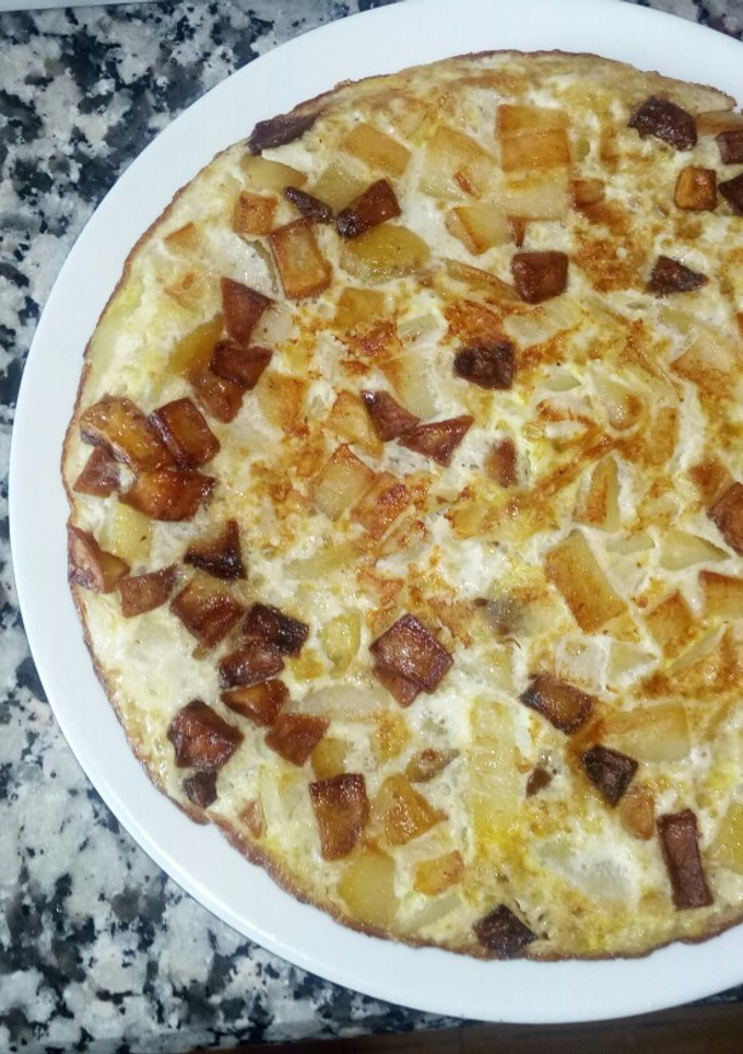 Una foto de Tortilla de papas con cebolla