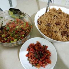 A picture of Pilau serverd with kachumbari.