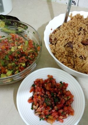 A picture of Pilau serverd with kachumbari.