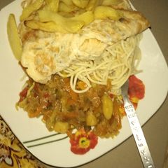A picture of Spaghetti with vegetable sauce.