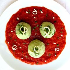 A picture of Paneery Malfatti in Tomato Sauce.