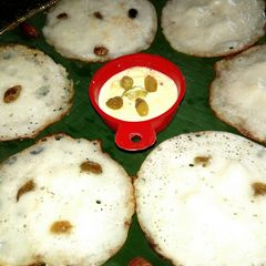 Chitau Pitha with Coconut(Appam) A picture of Chitau Pitha with Coconut(Appam).