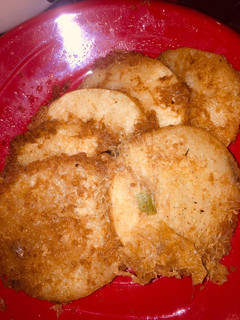 A picture of Circled fried yam wit egg.