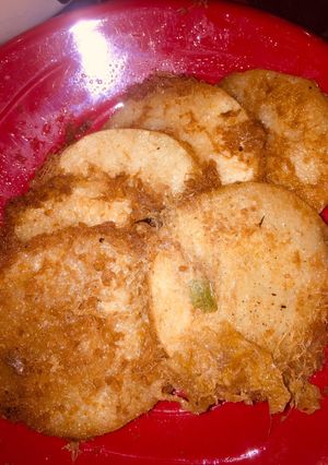 A picture of Circled fried yam wit egg.