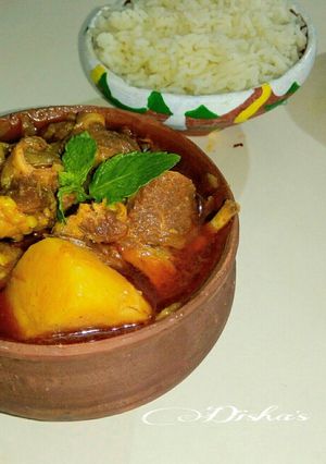 A picture of Bengali Style Mutton Curry with potatoes.