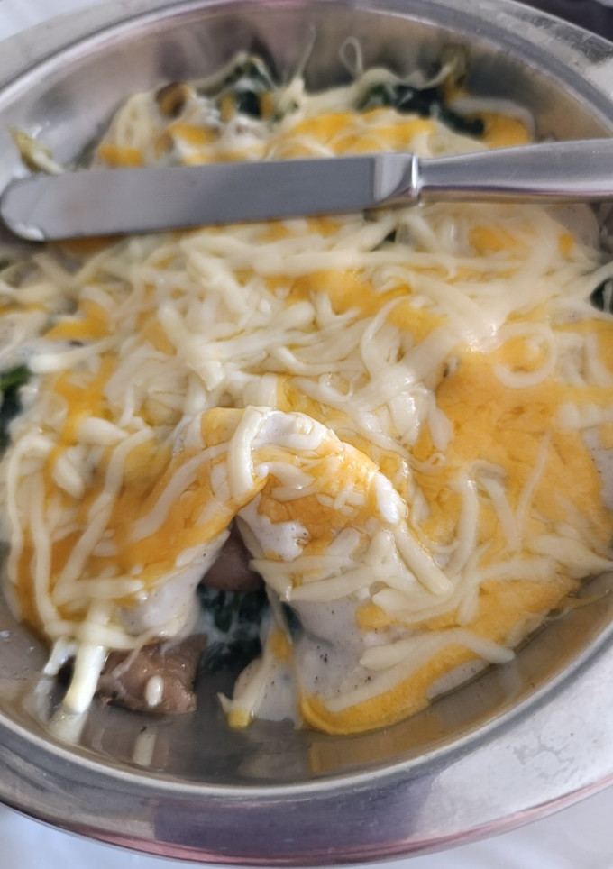Una foto de Espinacas gratinadas 4 quesos