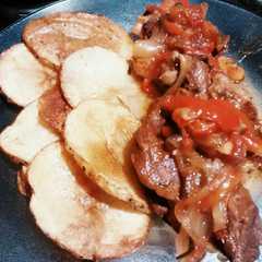 Una foto de Bifes a la criolla