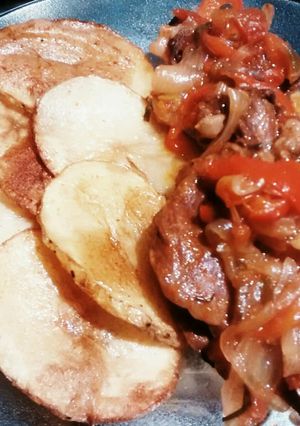Una foto de Bifes a la criolla