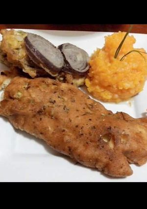 Una foto de Filet de merluza al pimentón