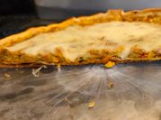 Una foto de tarta puerros