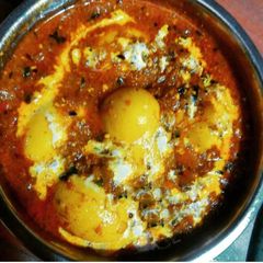 A picture of Egg Garlic Masala Curry.
