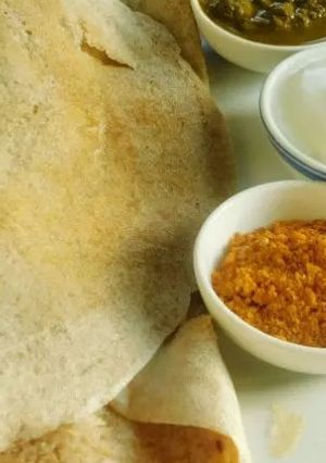 A picture of Nutritious dosa made with pearled kodo millet flour and teff flour.