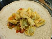 Una foto de tortellini de queso