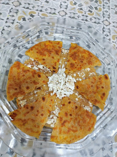 A picture of Flower Paneer Onion Paratha.