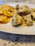 Presa ibérica en salsa de mostaza con patatas