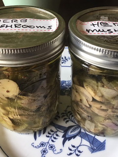 A picture of California Farm Pickled Mushrooms.