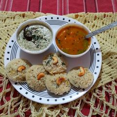 A picture of Instant masala rava idli with Sambar and chutney.