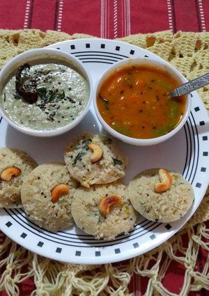 A picture of Instant masala rava idli with Sambar and chutney.
